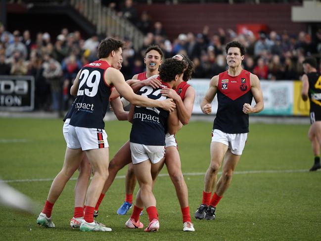 MPFNL Division One Seniors, Grand Final: Dromana FNC Seniors vs Mt Eliza FNC Seniors played at Kinetic Park, Frankston, Victoria, Sunday 15th September 2024. Mt Eliza player Lachlan Williams kicks another goal and celebrates with teammates  Picture: Andrew Batsch