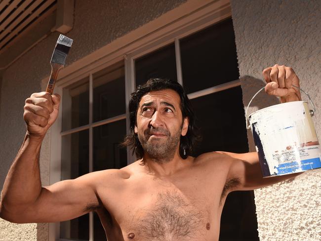 James Penlidis protested an inappropriate development next door by painting his house while naked. Picture: Chris Eastman