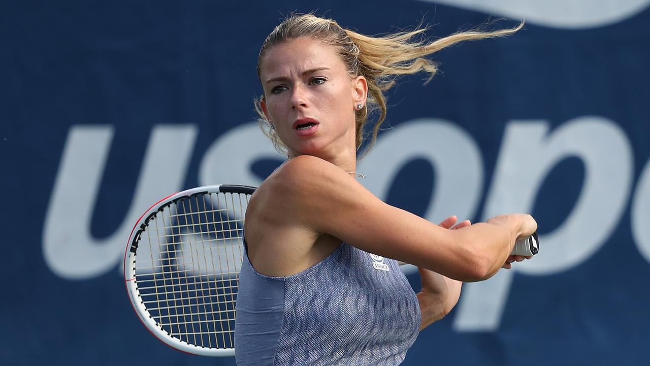 NEW YORK, NEW YORK - AUGUST 26: Camila Giorgi of Italy returns a shot during her Women's Singles first round match against Maria Sakkari of Greece during day one of the 2019 US Open at the USTA Billie Jean King National Tennis Center on August 26, 2019 in the Flushing neighborhood of the Queens borough of New York City. (Photo by Matthew Stockman/Getty Images)