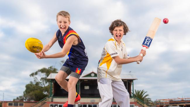 Mentone footy and cricket kids Fletcher Gardner and Darcy Arnott. The club has kept prices down to $140 a season for cricket. Picture: Jason Edwards