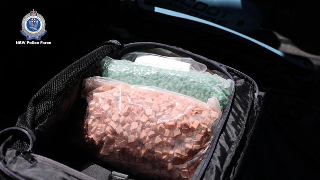 Police allegedly found and seized 4000 MDMA pills at the property, as well as about 280g of cocaine and $185,000 cash. Picture: NSW Police