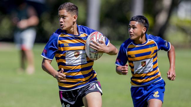 Day One of King of the Country rugby tournament at James Overell Park, Southport. possible. Sunshine Coast Invitational Barbarians U13s (Blue/yellow with ball) v USQ Saints U13s. Picture: Jerad Williams