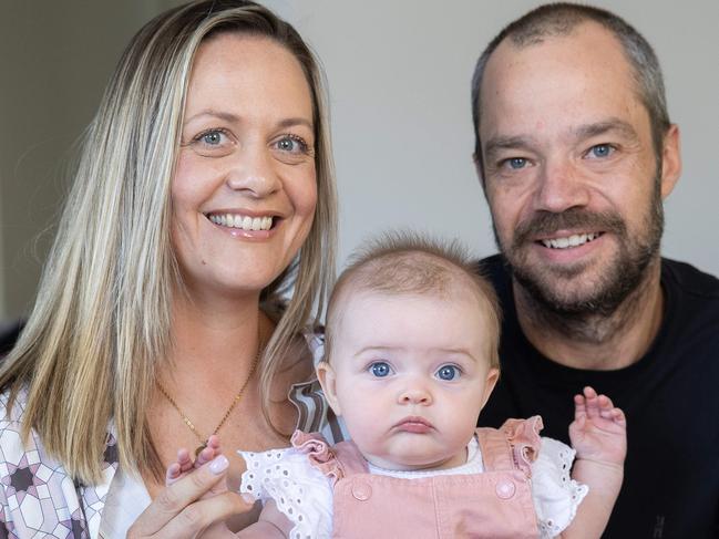 Carly De Mamiel and Steven Hosking with Harlow, 5 months. The couple found out they had to do IVF and now have a baby girl. The couple at their home in Carrum. Picture: Jason Edwards