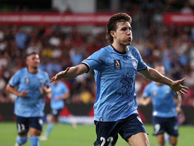 Max Burgess celebrates after scoring his derby goal for Sydney FC. Picture: Cameron Spencer/Getty Images