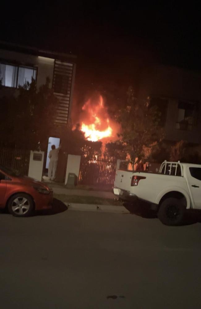 Neighbours tried to save a townhouse that was destroyed in a blaze on Olivia Cres, Nirimba, on August 26.