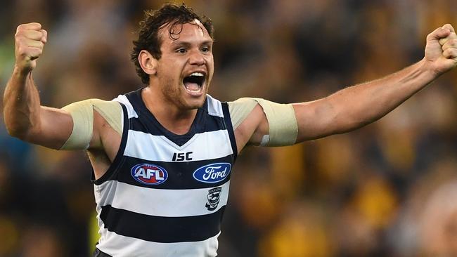 MELBOURNE, AUSTRALIA — SEPTEMBER 09: Steven Motlop of the Cats celebrates winning the 2nd AFL Qualifying Final match between the Geelong Cats and the Hawthorn Hawks at Melbourne Cricket Ground on September 9, 2016 in Melbourne, Australia. (Photo by Quinn Rooney/Getty Images)