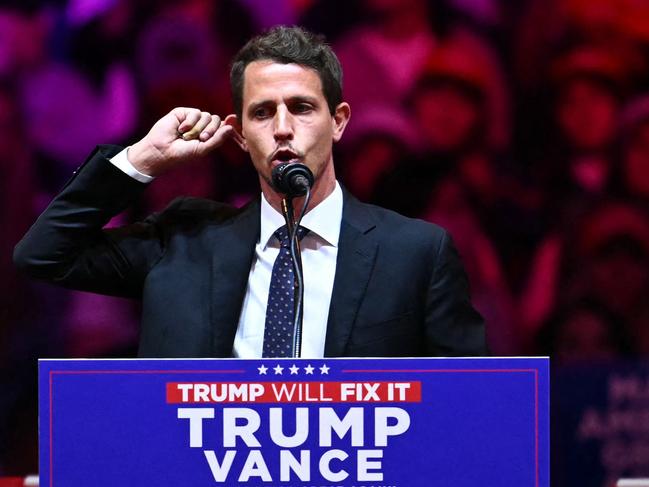 (FILES) US comedian Tony Hinchcliffe speaks during a campaign rally for former US president and Republican presidential candidate Donald Trump at Madison Square Garden in New York on October 27, 2024. Donald Trump was struggling October 28, 2024 to contain the blast radius of a fierce backlash to racist rhetoric targeting Puerto Ricans at his weekend rally, just nine days ahead of a presidential election that could be determined by the Latino vote. (Photo by ANGELA WEISS / AFP)