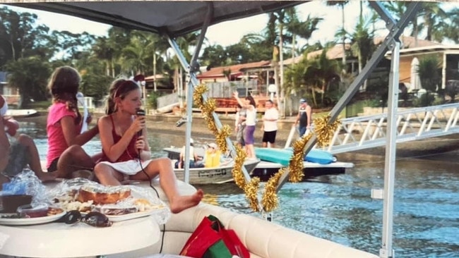 Libby Hewson at eight-years-old celebrating the Carols on the Creek event