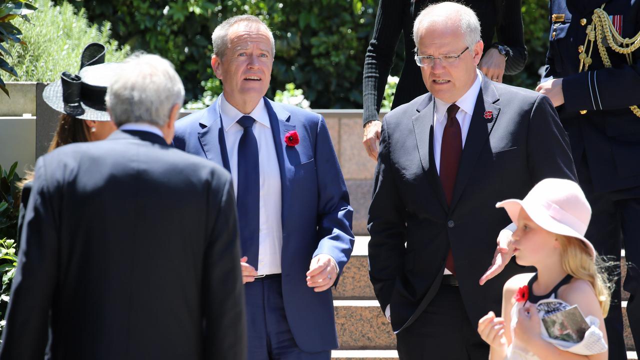 Prime Minister Scott Morrison (right) with Opposition Leader Bill Shorten at the Remembrance Day service at the Australian War Memorial in Canberra. Picture Gary Ramage