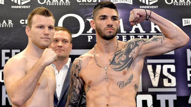 Jeff Horn, left, and Michael Zerafa pose at Tuesday’s weigh-in