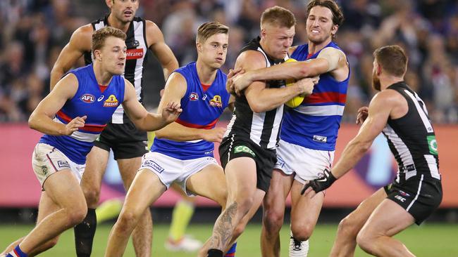 Jordan De Goey tries to burst out of midfield against Western Bulldogs. Picture: Michael Klein.