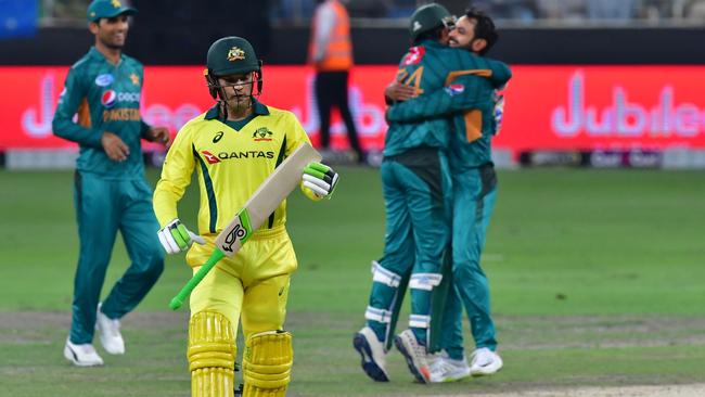 Alex Carey departs after being dismissed against Pakistan.