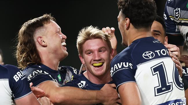 SYDNEY, AUSTRALIA - JUNE 25:  Tom Dearden of the Cowboys celebrates with team mates after scoring a try during the round 17 NRL match between South Sydney Rabbitohs and North Queensland Cowboys at Accor Stadium on June 25, 2023 in Sydney, Australia. (Photo by Matt King/Getty Images)