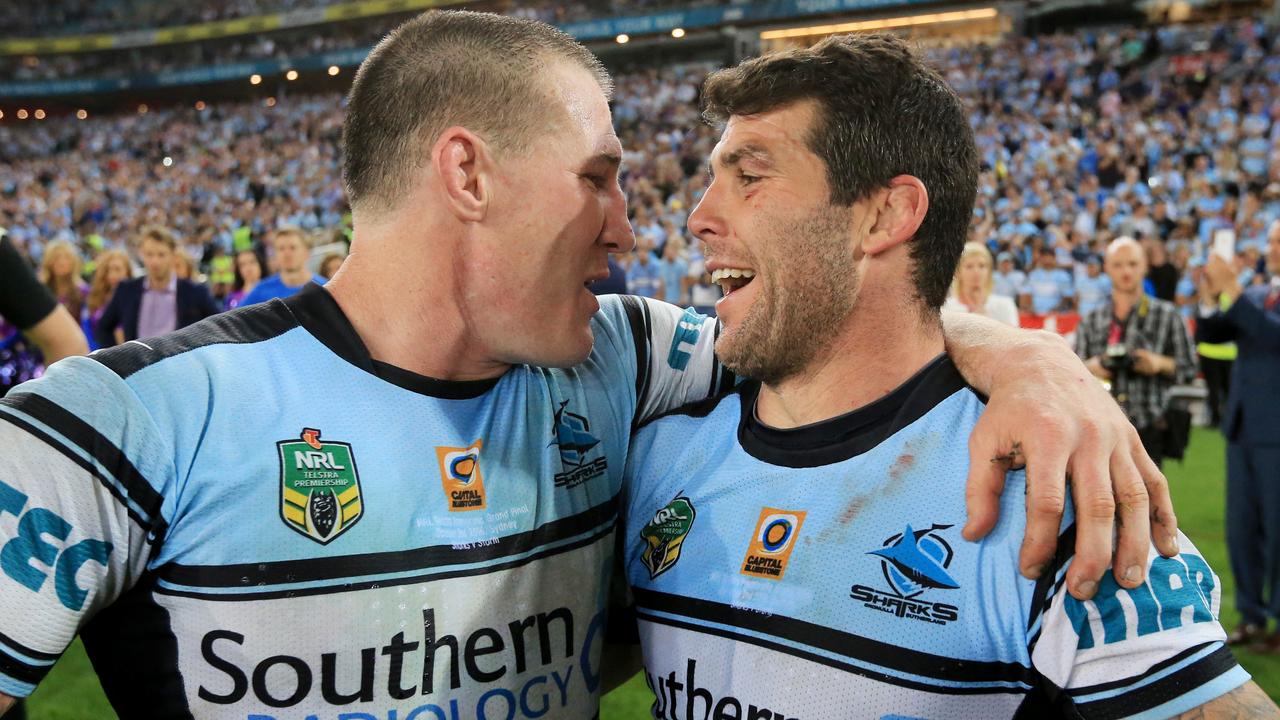 Paul Gallen and Michael Ennis celebrate the 2016 premiership win with Cronulla.