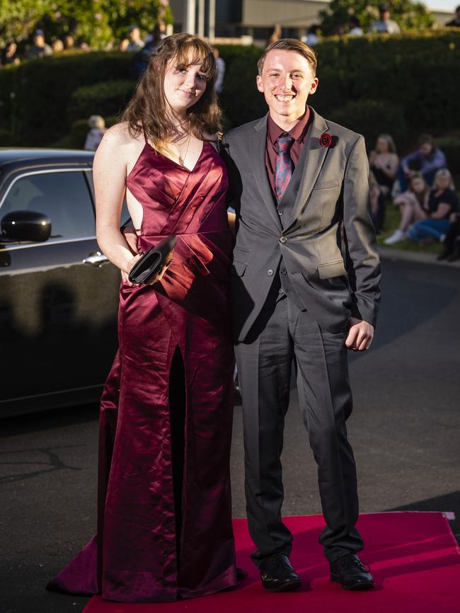 Jasmine Boland and Adrian Anderson arrive at Harristown State High School formal at Highfields Cultural Centre, Friday, November 18, 2022. Picture: Kevin Farmer