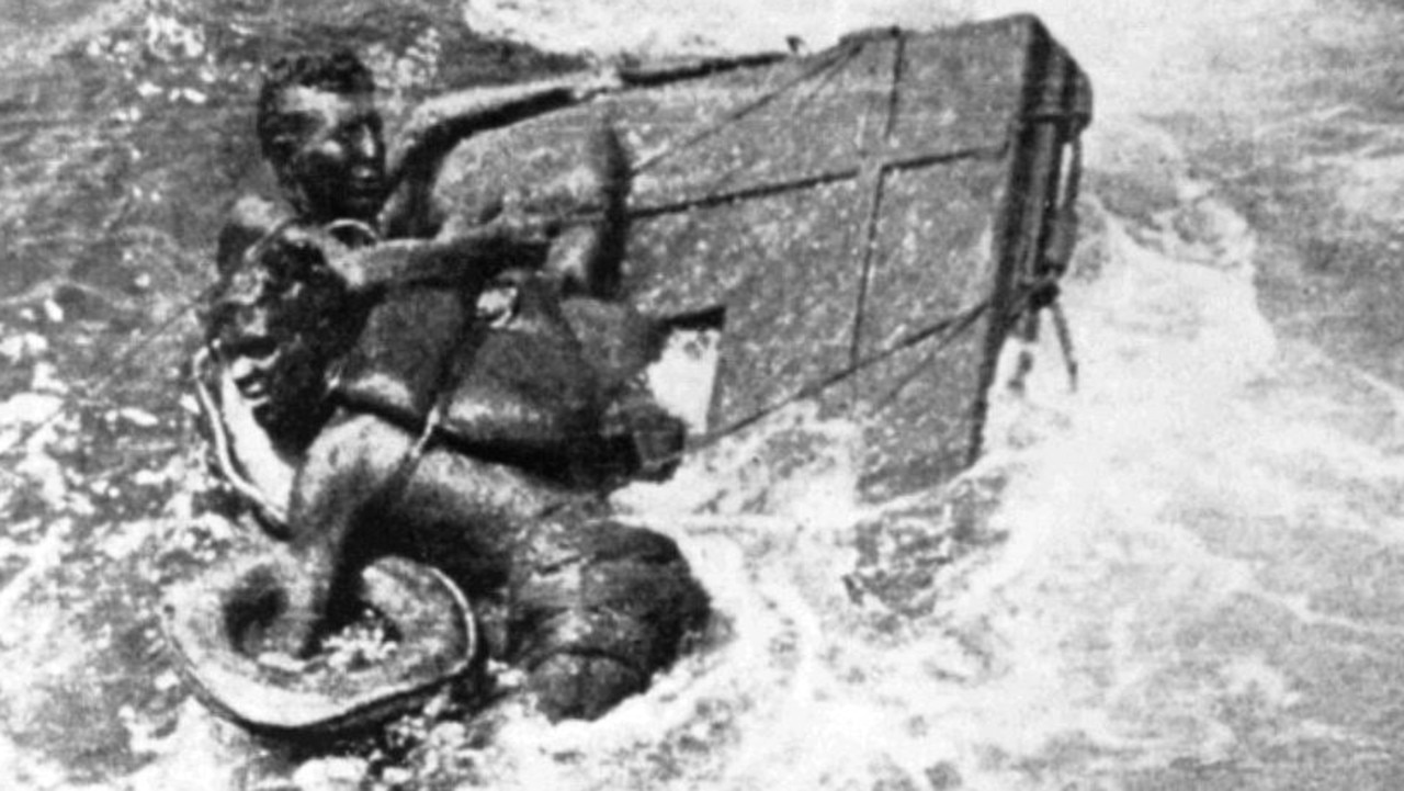 Prisoners of war cling to life rafts during their rescue after the sinking of the Rokyu Mara. Picture: Australian War Memorial