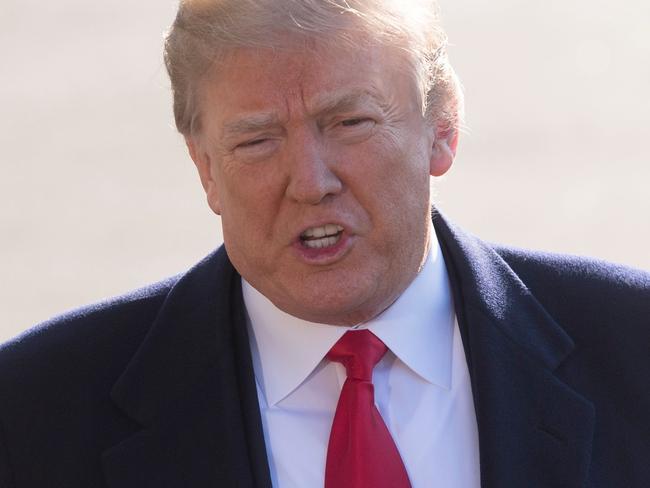 US President Donald Trump speaks to the media prior to departing on Marine One from the South Lawn of the White House in Washington, DC, March 13, 2018, as he travels to California for the first time as President. Donald Trump wanted to change up his cabinet team before launching high-stakes negotiations with North Korea, a senior US official said Tuesday, after the president announced Mike Pompeo would succeed Rex Tillerson as his top diplomat. / AFP PHOTO / SAUL LOEB