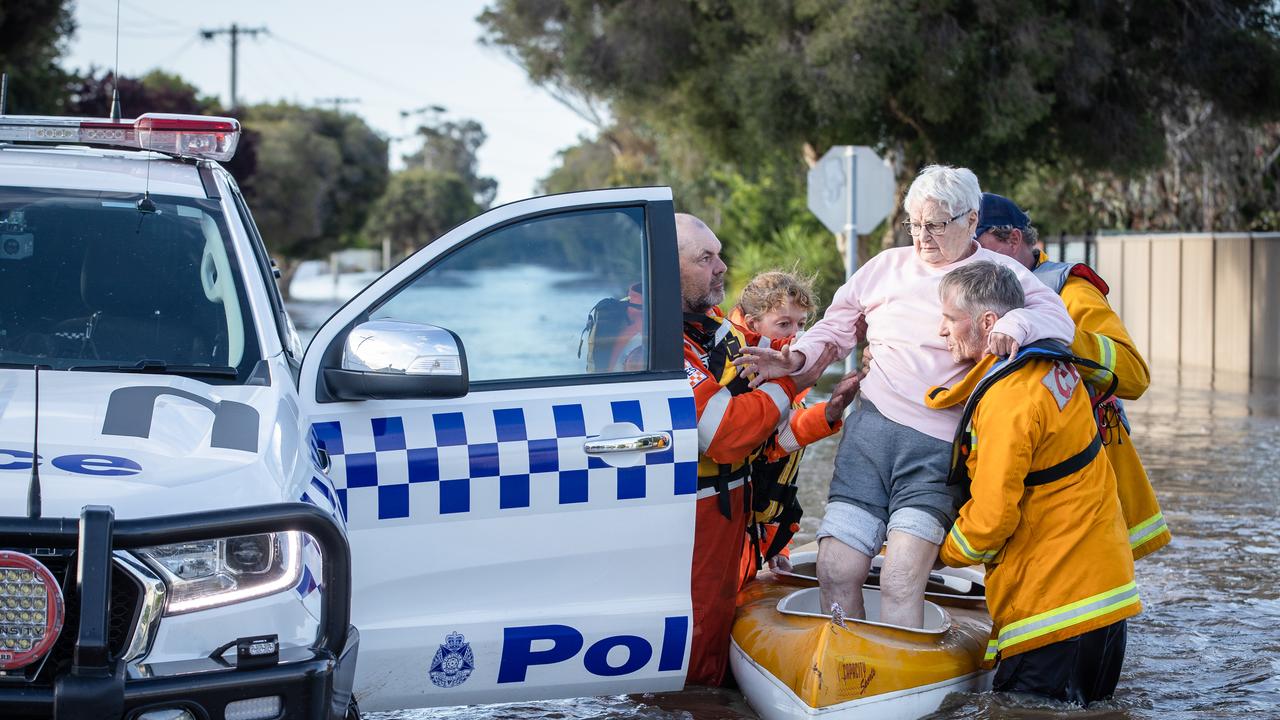 Residents were put on buses and taken to higher towns nearby. Picture: Jason Edwards