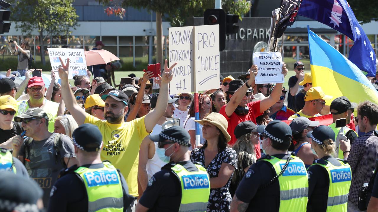 Police keep an eye on a freedom rally in Melbourne. Picture: David Crosling/NCA NewsWire