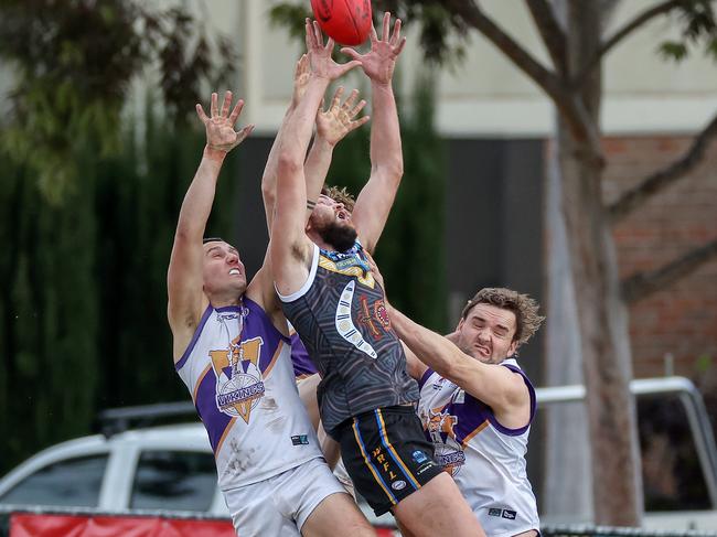 WRFL: Liam Read of Caroline Springs flies for the mark. Picture: George Salpigtidis