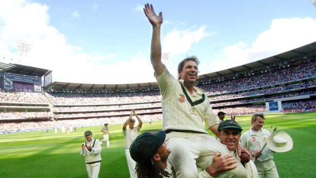 Warnie gets a hero’s farewell on the shoulders of Andrew Symonds and Matthew Hayden.