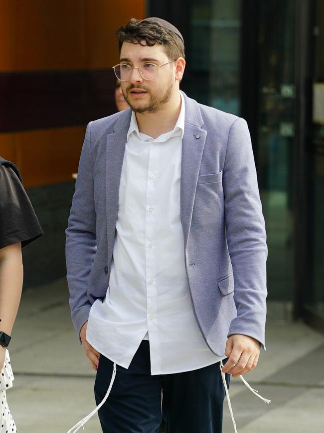 Liam Arnold-Levi following the former students win in the Federal Court. Picture: Luis Enrique Ascui