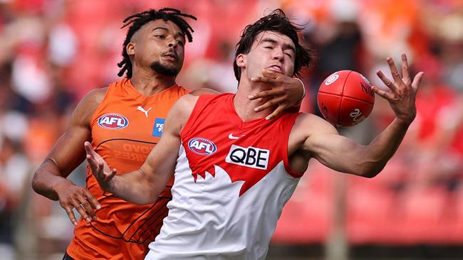 SYDNEY, AUSTRALIA - MARCH 07: LoganÃÂ McDonald of the Swans marks during the AFL Community Series match between the Sydney Swans and the Gold Coast Suns at GIANTS Stadium on March 07, 2021 in Sydney, Australia. (Photo by Cameron Spencer/Getty Images)