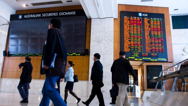 The deal rush, which bankers are hoping will turn into a true turnaround next year, is coming at the end of a tough year in investment banking, marked by weak confidence, low deal volumes, longer lead times and lay-offs. Picture: Bloomberg