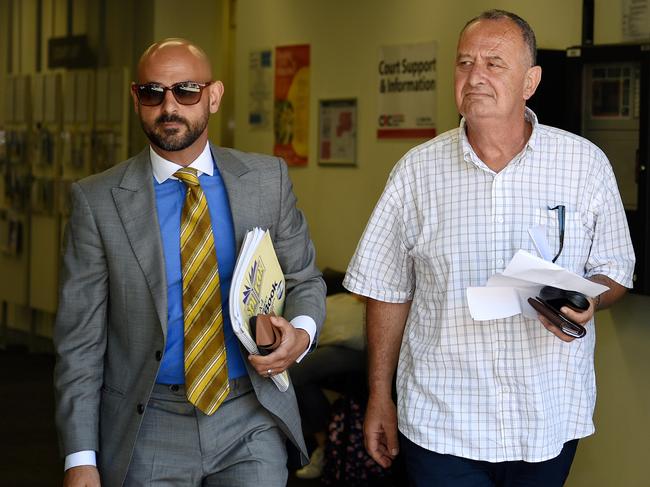 (L-R) Lawyer Omar Juweinat and former Labor NSW minister Milton Orkopoulos are seen leaving Waverley Local Court in Sydney, Wednesday, January 22, 2020. Convicted child sex offender and ex-NSW MP Milton Orkopoulos has been arrested, with police saying it is not related to any parole breach. (AAP Image/Bianca De Marchi) NO ARCHIVING