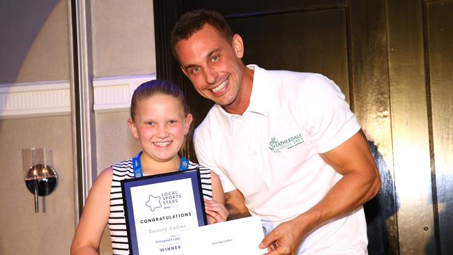 Destiny Collier pictured receiving an award at the Newslocal local sports star awards, The Epping club, Epping, NSW, Australia, 2 November 2017. (AAP IMAGE / Damian Shaw)