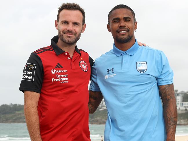 SYDNEY, AUSTRALIA - FEBRUARY 05: Juan Mata of the Wanderers and Douglas Costa of Sydney FC pose for a photograph during a Sydney A-League Derby media opportunity at Bondi Beach on February 05, 2025 in Sydney, Australia. (Photo by Brendon Thorne/Getty Images)