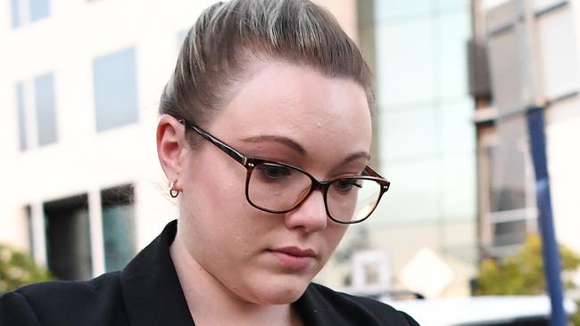 Thunder River Rapids ride operator Courtney Williams leaves the inquest into the Dreamworld disaster. Picture: AAP Image/Dan Peled