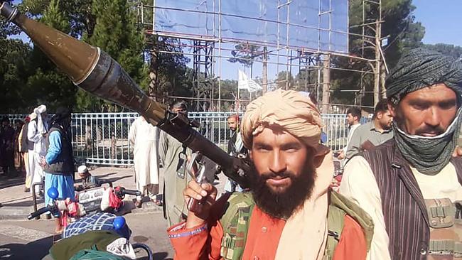 A Taliban fighter holds a rocket-propelled grenade (RPG) along the roadside in Herat, Afghanistan's third biggest city. Picture: AFP