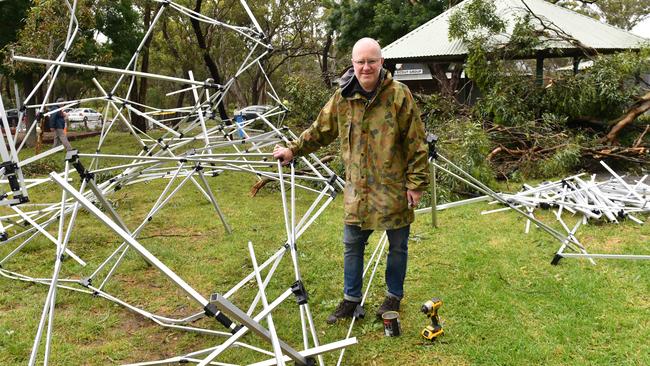 Rotary member Martin Gould with marquee scaffolding damaged in the storm. Picture: Keryn Stevens