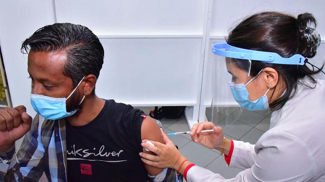 A coronavirus vaccine is injected in Mauritius. Picture: AFP