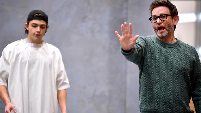 Joe Klocek as (Eli Bell) and director Sam Strong in rehearsals for Boy Swallows Universe at Queensland Theatre. Picture: NCA NewsWire / John Gass