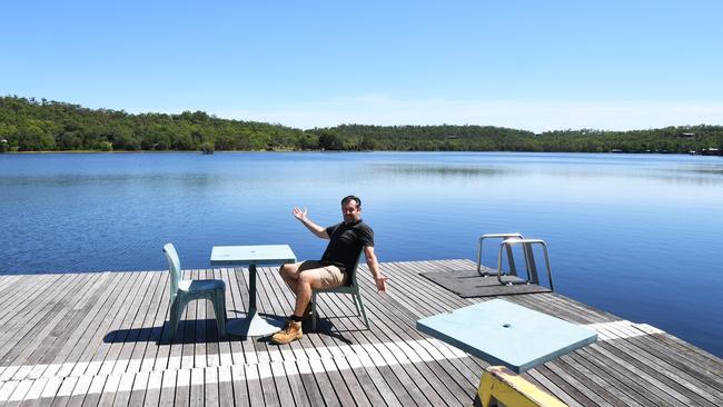 Lake Bennett Resort director and manager Andrew Gunn at the freshwater lake at the site. Picture: Katrina Bridgeford