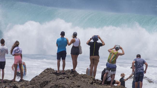 The crowds watching surfers at Snapper Rocks on Sunday 2 January 2022. Picture: Jerad Williams