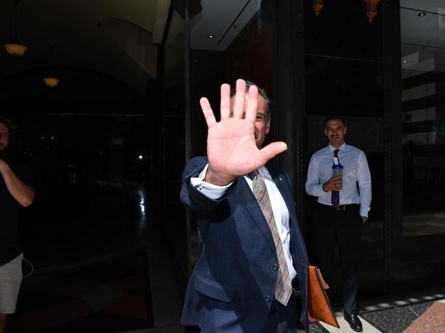 Andrew O'Keefe leaves the Downing Centre Local Court in Sydney.