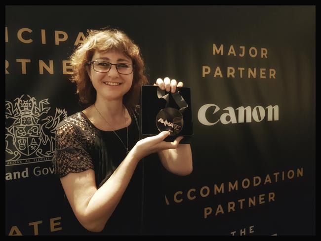 Wendy McDougall with her AWMA (Australian Women in Music Awards) award last year for best photographer.