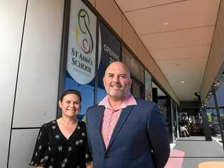 TOP JOB: Sonny Smith will be the foundation principal at St Ann's School at Redbank Plains, which opens next year. He stands alongside enrolment officer Melissa Goodingham. Picture: Rob Williams