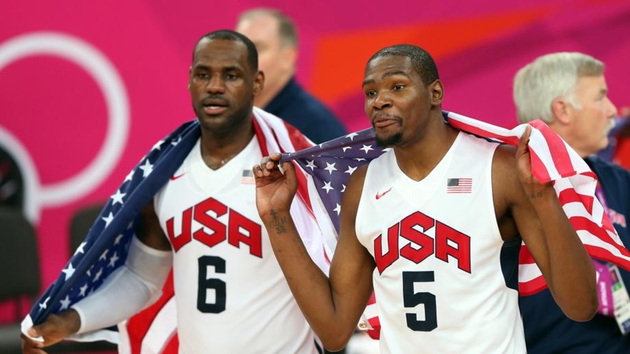 LONDON, ENGLAND - AUGUST 12: Team mates LeBron James #6 of the United States and Kevin Durant #5 of the United States celebrate winning the Men's Basketball gold medal game between the United States and Spain on Day 16 of the London 2012 Olympics Games at North Greenwich Arena on August 12, 2012 in London, England. The United States won the match 107-100. (Photo by Streeter Lecka/Getty Images)