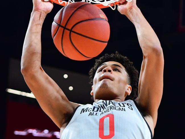 ATLANTA, GA - MARCH 27: Josh Green #0 of IMG Academy in Florida dunks during the 2019 McDonald's High School Boys All-American Game on March 27, 2019 at State Farm Arena in Atlanta, Georgia.   Scott Cunningham/Getty Images/AFP == FOR NEWSPAPERS, INTERNET, TELCOS & TELEVISION USE ONLY ==