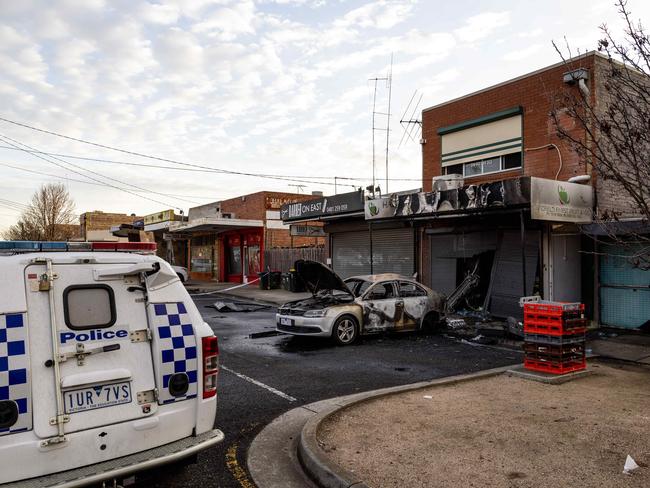 Police investigate fire at Hadfield grocer. Picture: Jason Edwards