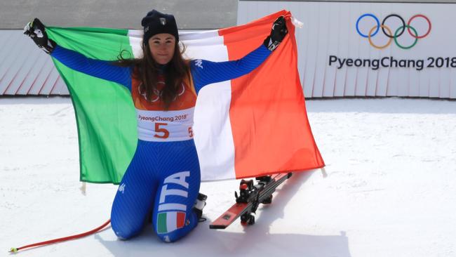 Italy’s Sofia Goggia celebrates gold in the downhill. Picture: Getty