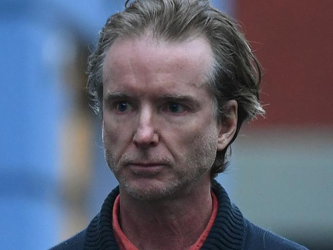 Jonathan Peter Doig leaves Sutherland Police Station in Sydney, Wednesday, June 10, 2020. Doig, Greens federal election candidate who allegedly paid to watch and direct the live stream of a child being sexually abused in the Philippines has been granted strict conditional bail. (AAP Image/Joel Carrett) NO ARCHIVING