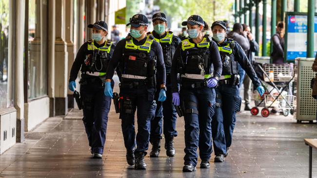 Police patrol the streets of Melbourne during lockdown. Picture: Sarah Matray