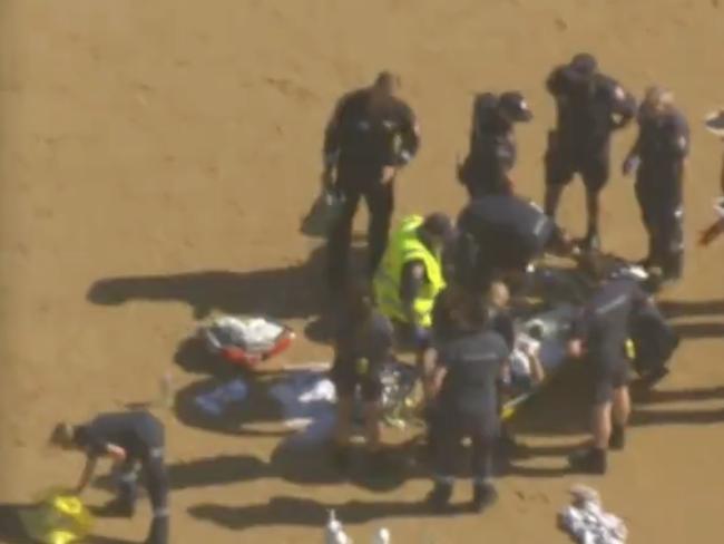 Three people were pulled from the surf on Wednesday afternoon. Picture: 7News