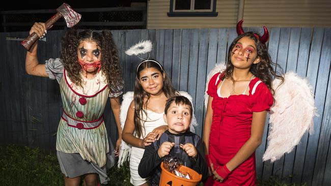 Outside Rae's House of Horrors are (from left) Kyra Weatherall, Lakeisha Weatherall, Malakai Weatherall and Jazelle Johnson on Halloween, Sunday, October 31, 2021. Picture: Kevin Farmer