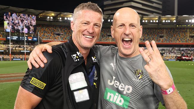 Greg 'Clanger' Kleynjans with Richmond Tigers coach Damien Hardwick after the 2020 AFL Grand Final victory.2020 AFL Grand Final match between the. Richmond Tigers and the Geelong Cats at the Gabba on October 24, 2020 in Brisbane, Australia.        Picture : Michael Klein